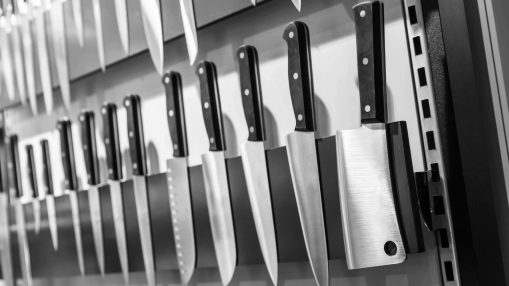 Set of professional kitchen knives designed for home chefs, showcasing sharp, high-quality blades for precision cutting and food preparation.