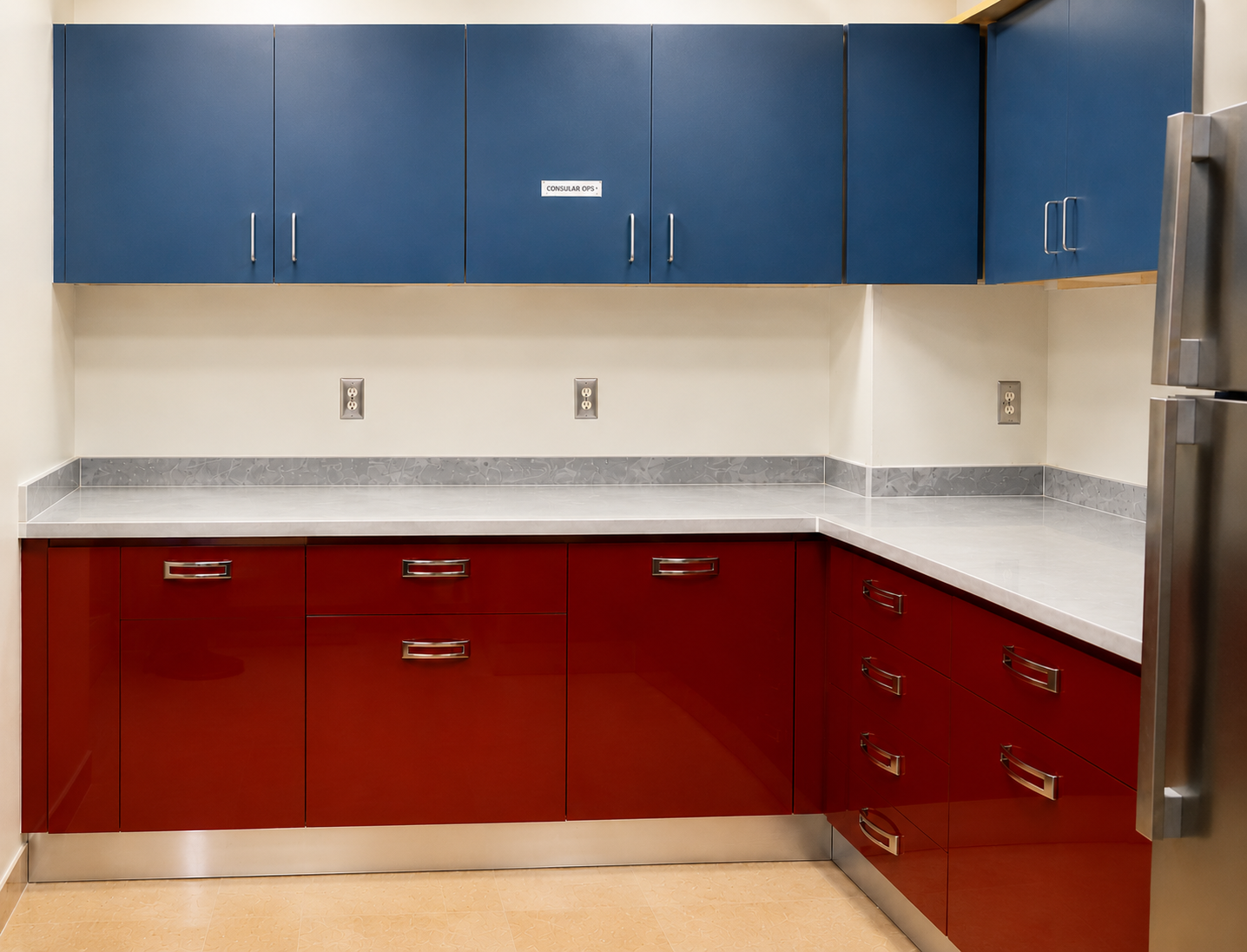 Custom modular storage cabinet installation completed for the US Consulate Lagos featuring glossy red lower cabinets and blue overhead cabinets — HOG Furniture Projects 2017