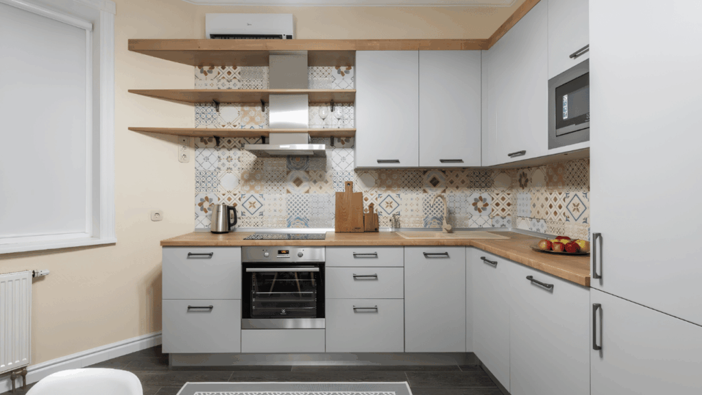 Modern kitchen featuring a stylish area rug that adds comfort, safety, and decorative appeal to the cooking