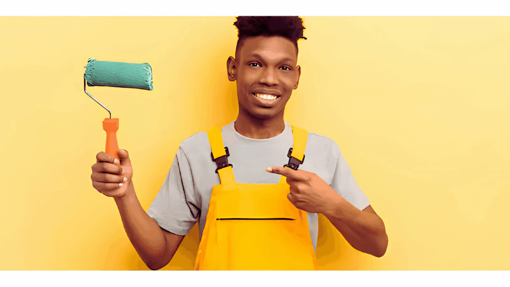 Professional painter applying fresh paint to a stylish living room, enhancing the home's interior décor with a modern color palette.