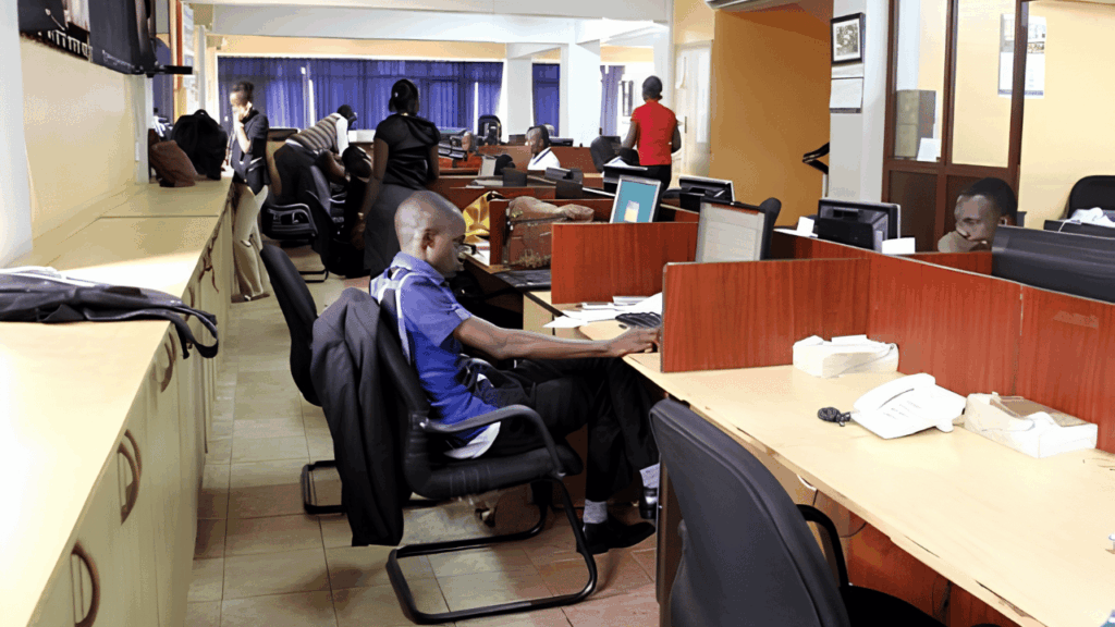 Employee working at a desk in a comfortable office while practicing healthy mind and body habits