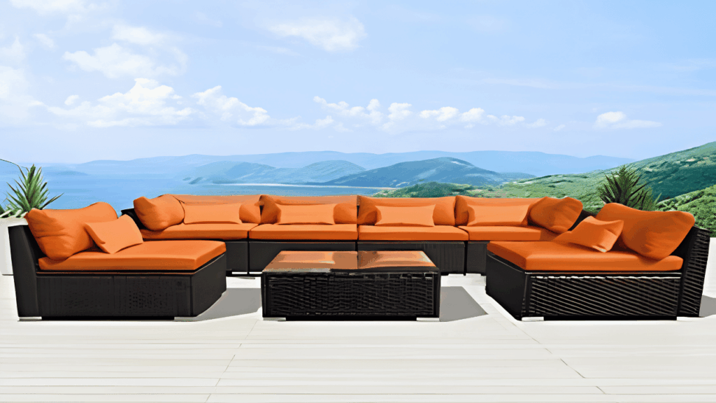 Outdoor furniture arranged on a patio with cushions and accessories for a comfortable and inviting space