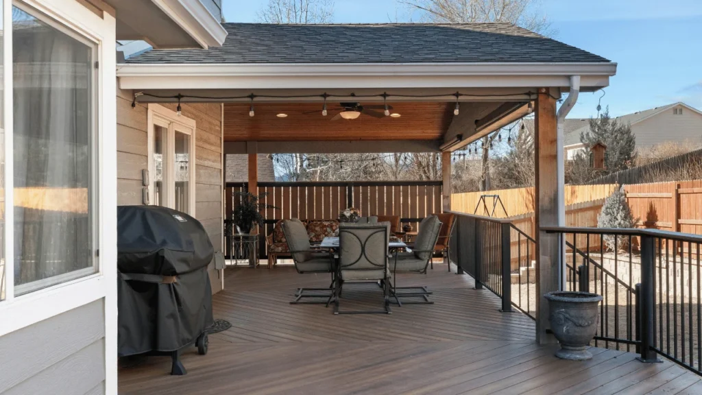 Outdoor living deck with stylish furniture and décor