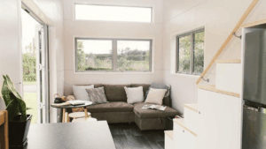 Spacious-looking living room with smart furniture and interior design