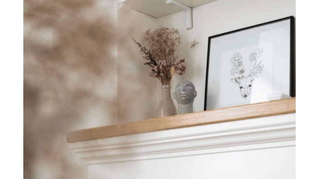 Five creative ways to display family and personal photos around the home using gallery walls, shelves, frames, and decorative arrangements.