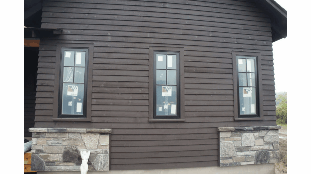 Modern home with custom siding designed to enhance exterior appearance, weather protection, durability, and curb appeal.