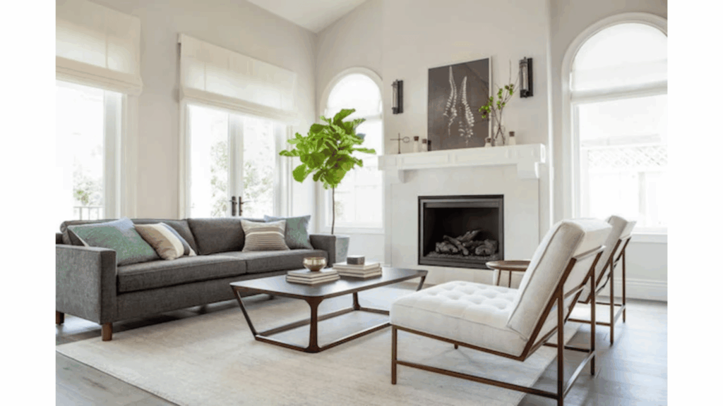 Modern living room featuring a comfortable sofa, stylish coffee table, practical lighting, area rug, and coordinated decorative accessories.