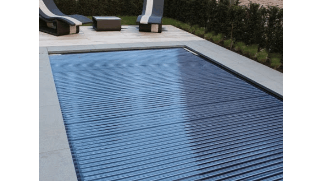 High-end swimming pool cover protecting a residential pool while helping maintain cleanliness, safety, and water quality.